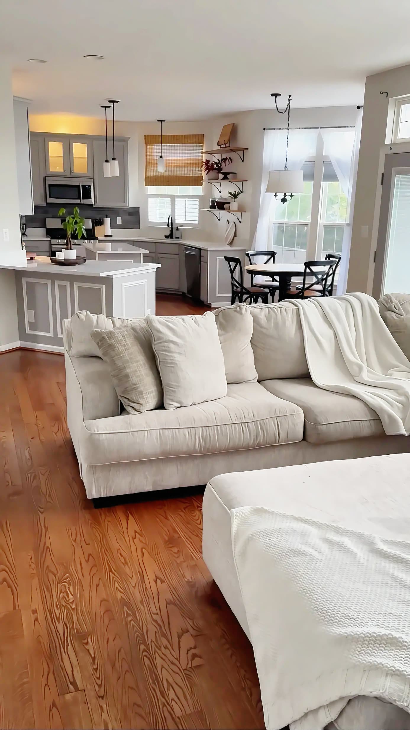 Bright, freshly cleaned open-plan living room and kitchen
